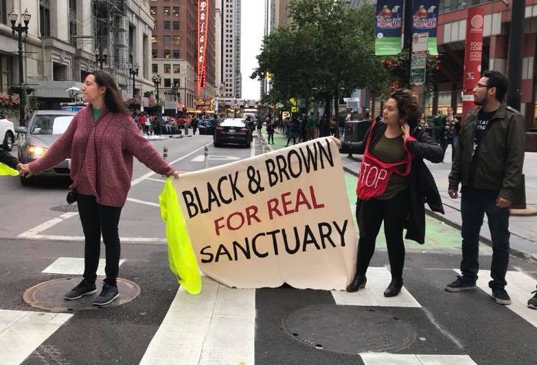 LIFE-SIZE GRAPHS BLOCKING STREETS OUTSIDE CITY HALL SHOW WHY CHICAGO IS NOT A SANCTUARY CITY FOR BLACK AND BROWN PEOPLE